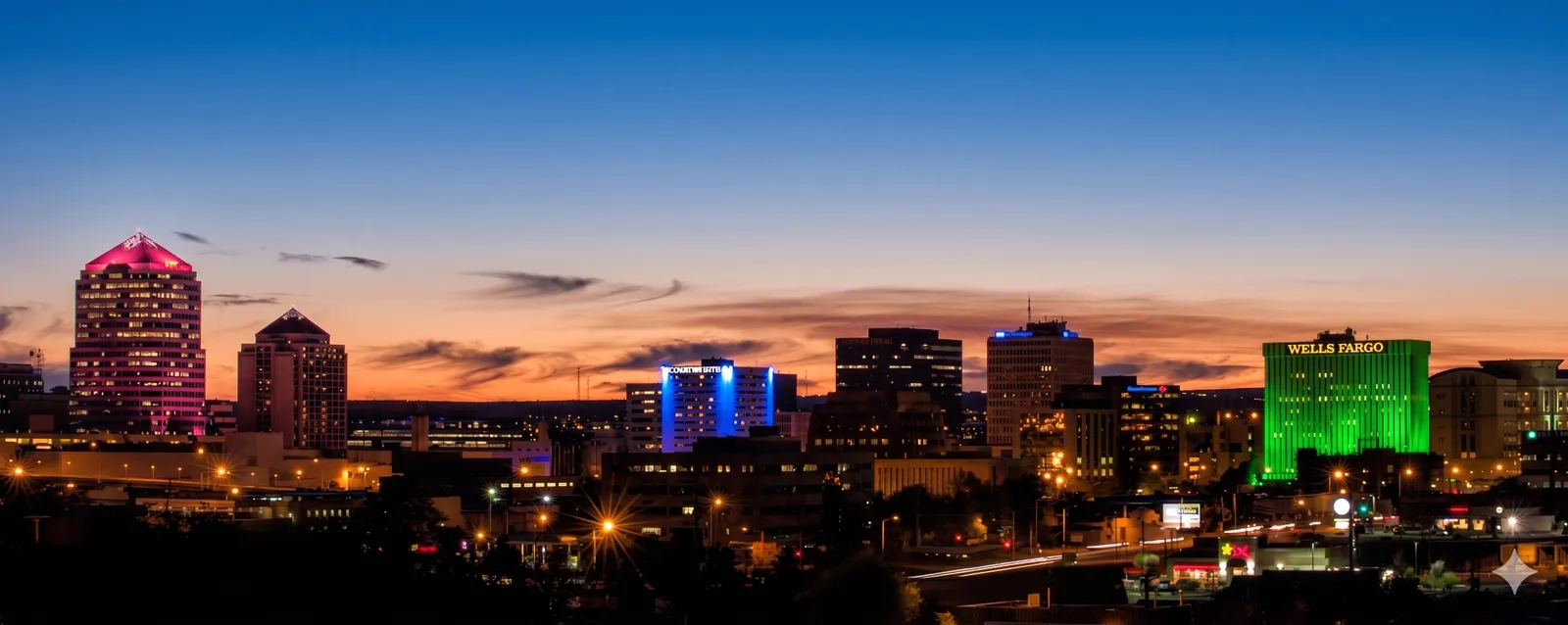 Albuquerque skyline at dusk with Sandia mountains