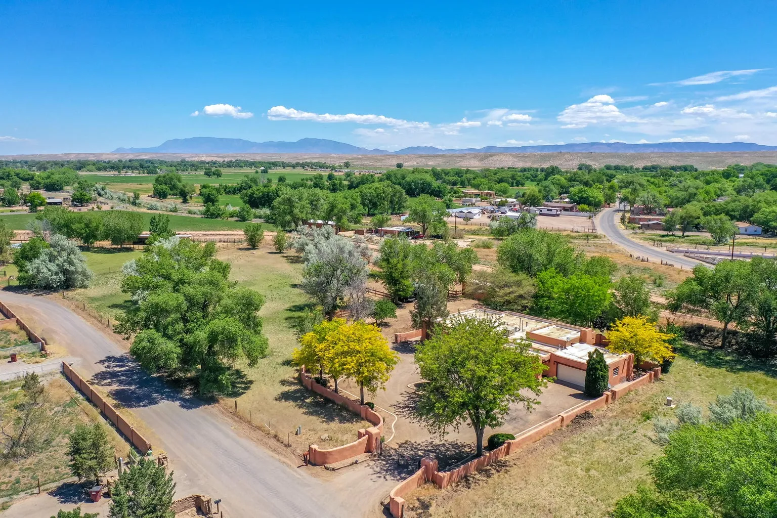 North Valley neighborhood near Albuquerque — Cottonwoods, acequias, and quiet adobe lanes along the Rio Grande.